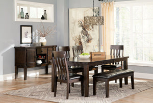 Made with select Oak veneers and hardwood solids with a dry smoky dark brown oak color. Edges and corners have a rounded off, worn effect for a casual look. Server has fully finished drawer boxes with ball bearing side guides. Sturdy looking knobs have de