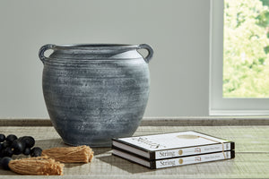  this vase offers a traditional feel courtesy of its terra cotta construction. The antiqued look is brought into the present with a distressed blue hue. It-'s an effortless way to elevate a centerpiece