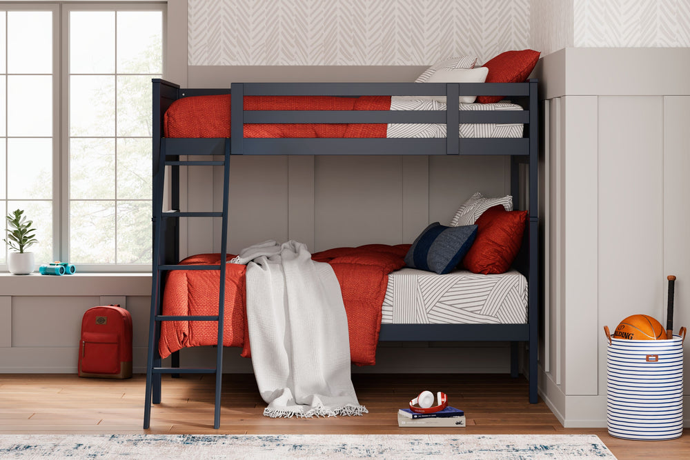 Maximize space and turn your kids-' bedtime into an adventure with this cool twin-over-twin bunk bed. It-'s an effortless addition to any bedroom, with a timeless Shaker style that-'s wonderfully finished in an on-trend blue. Guard rails on the top bunk h