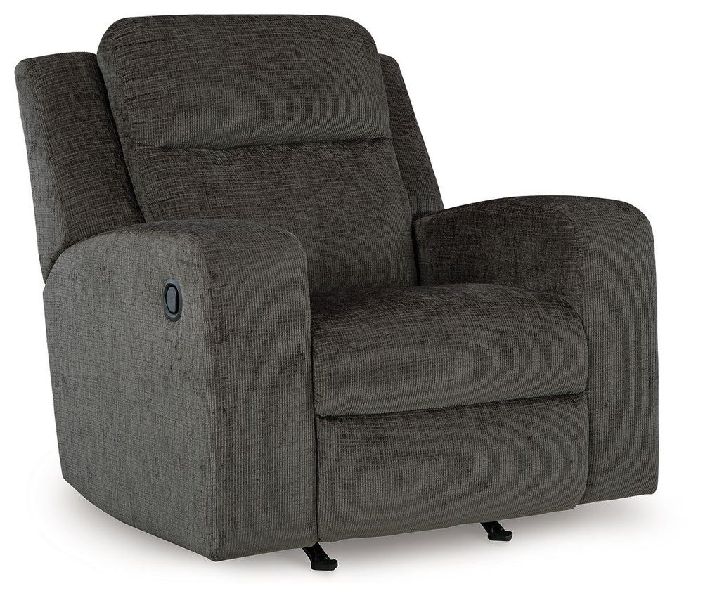 Indulgent comfort meets fashion-forward flair in this rocker recliner. Its luxuriously soft upholstery and captivating color show off your cozy yet smart style. Sleek track arms infuse a modern sensibility, while the gentle rocking motion makes this piece