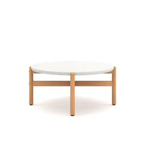 Introducing the Solstice Outdoor Coffee Table with Terrazzo Top, a stunning addition to your outdoor living space. Crafted from FSC Certified Acacia Solid Wood, this coffee table is both durable and eco-friendly, promising years of enjoyment. The light, c