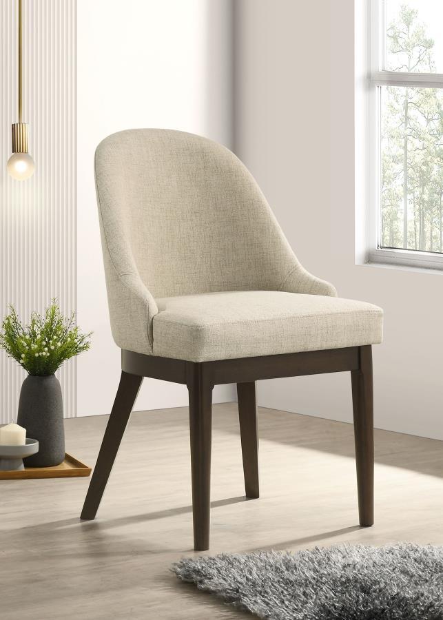 Enhance your dining experience with this sophisticated dining chair, featuring beige fabric upholstery for a cozy and refined touch. The curved backrest and generously padded seat ensure exceptional comfort. Built with a durable Asian hardwood frame in a 
