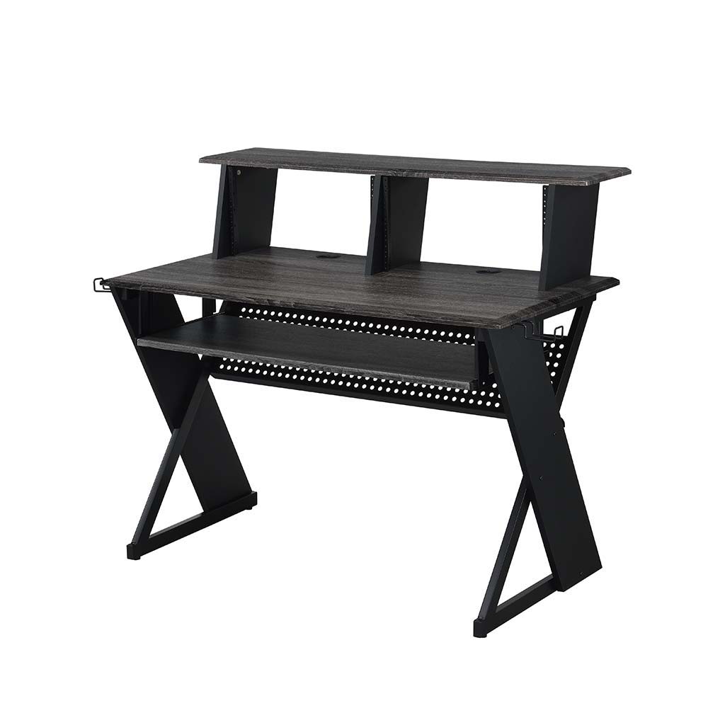 Keep your recording studio space organized while you create musical masterpieces with the Annette music desk. Smaller in size yet still powerful, the dek can securely hold all your equipment and gear. The shelf can be used to mount a monitor and speakers.