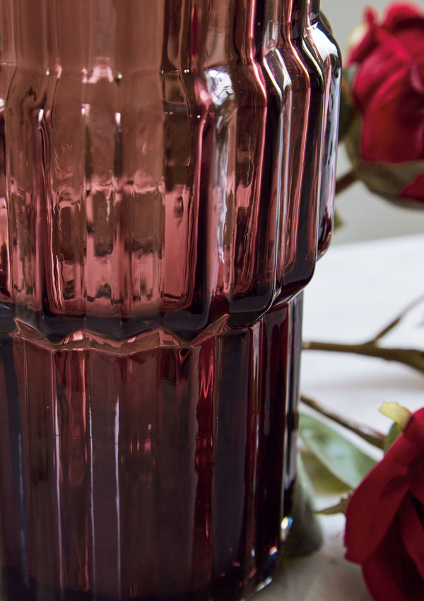  adds a captivating touch to indoor or outdoor decor. Its unique textured shape and oversized fluted details create an elegant art piece. Whether it-'s accentuating flowers or candlelight
