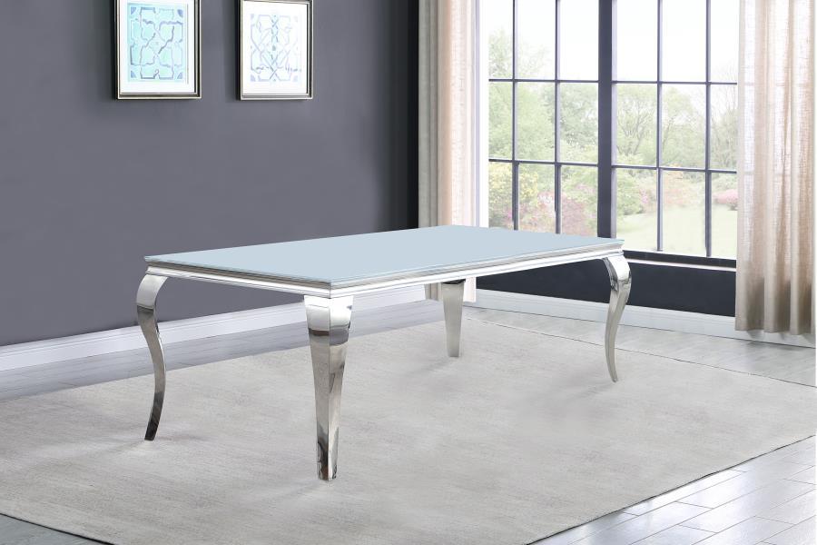 Glamorous with a luxurious touch, this elegant dining table makes the perfect addition to a formal dining space. With a mixed material design of durable stainless steel and glass, this dining table lends itself to several home decor styles. On each tradit
