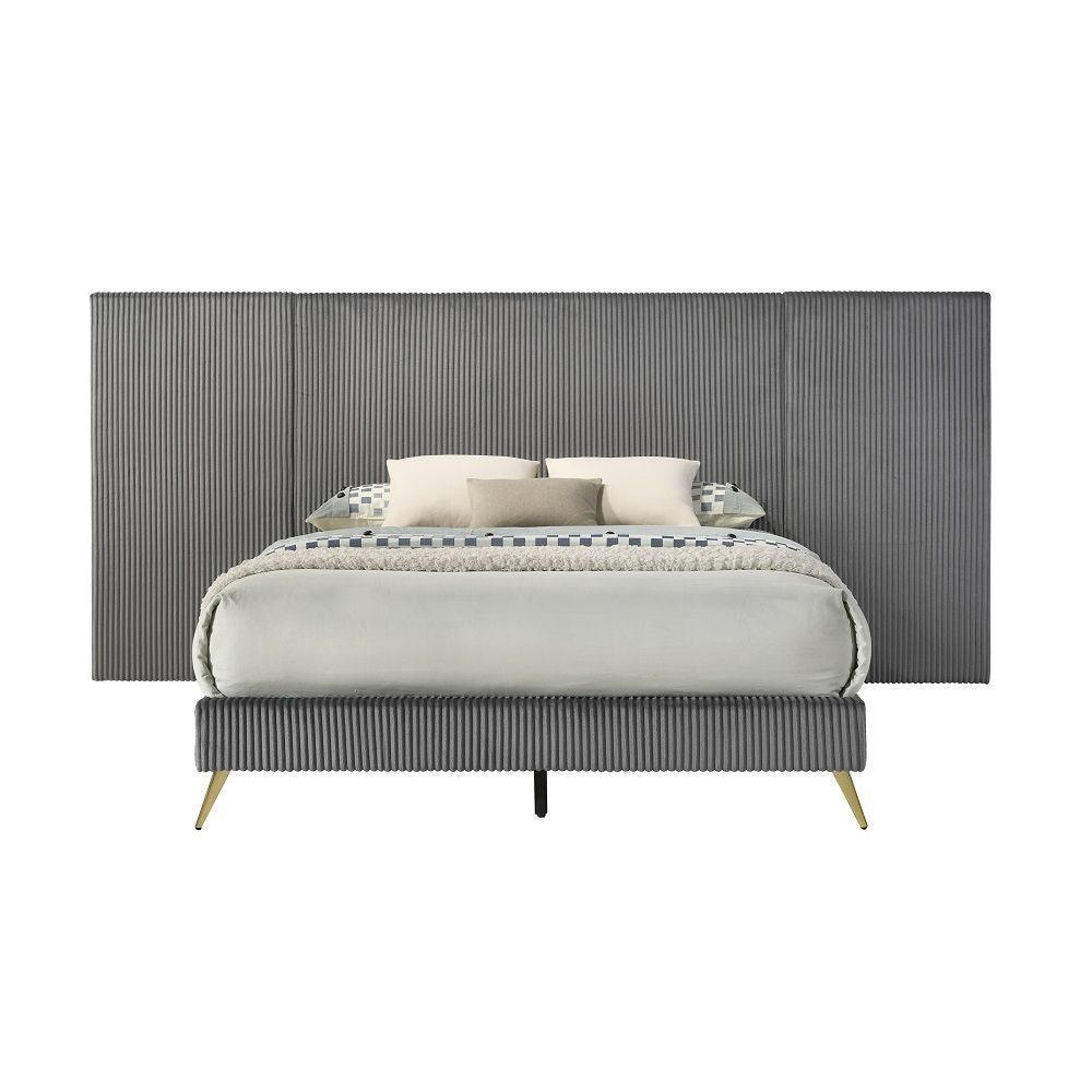 This Muilee bed is anything but subtle. It produces a bold statement in any bedroom. The bed is fully padded in a luxurious silver fabric. Its oversized channel-tufted headboard is an eye-catching focal point. This feature adds depth and visual contrast t