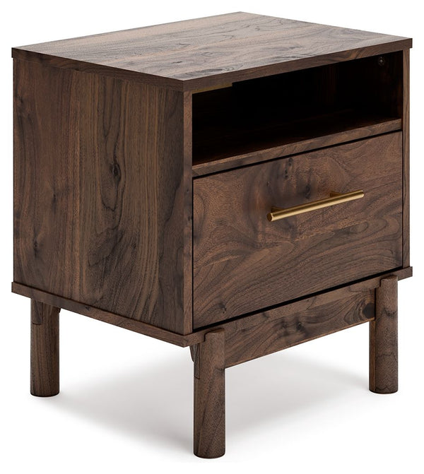 At the intersection of industrial cool and chic sophistication youâ€™ll find this nightstand. With a rich brown finish over replicated walnut wood grain, paired with a burnished goldtone handle, it offers an authentic touch that plays well any way you sty