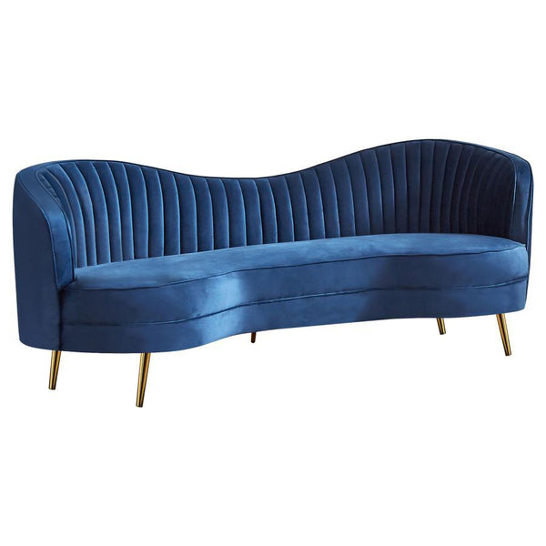 With an Art Deco flair, this retro-inspired sofa offers a striking curvy silhouette with a bold colored fabric. Wrapped entirely in a bright blue velvet that is super-soft to the touch, this contemporary sofa presents itself as the focal piece in your sea