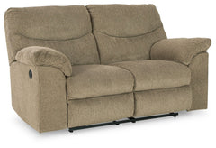 Sincere in its styling, this reclining loveseat invites a relaxed sensibility into your space. Its neutral upholstery has a universal appeal, with pull-tab reclining making it easy to kick back in comfort. Providing high-quality functionality at an afford