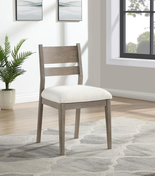  they feature coastal character with a grey wood finish that offers subtle wood grain patterning. Upholstery is a creamy white with wonderful text