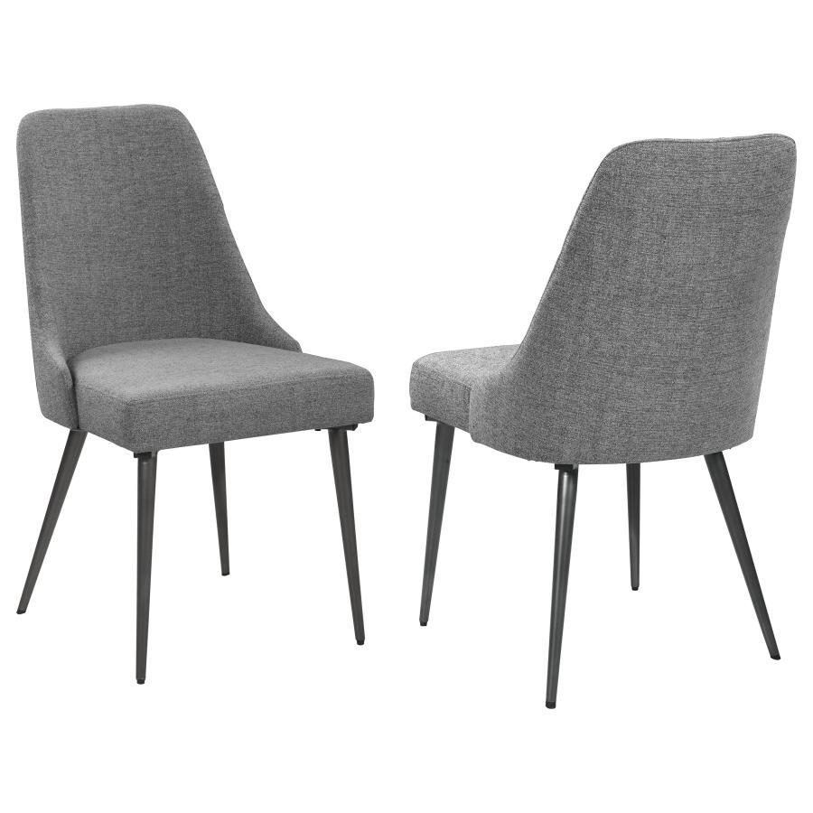 Channel mid-century charm with this armless side chair, wrapped in soft textured grey fabric. Its sleek wingback-inspired profile and gently tapered gunmetal legs bring a fresh, modern edge to dining spaces. Padded for comfort and built with durable mater