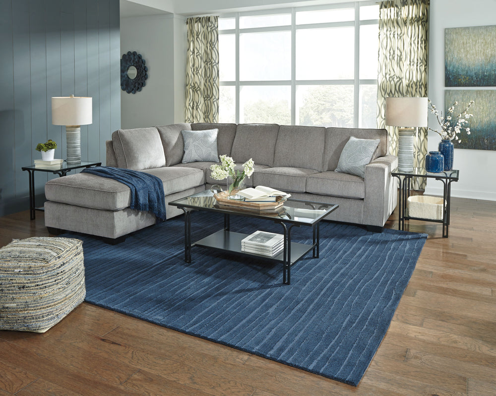 If style is the question, then this sectional is the answer. Sporting clean lines and sleek track arms, the decidedly contemporary profile is enhanced with plump cushioning and a chenille-feel upholstery, so pleasing to the touch. Sure to play well with s