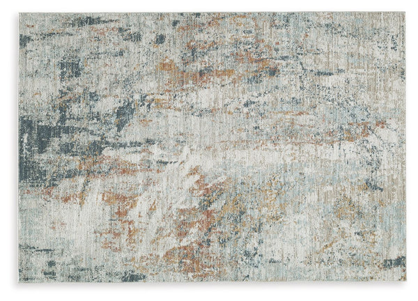 Loaded with visual textureâ€”and decidedly understated on colorâ€”this area rug is the essence of earthy, organic style. Abstract patterns dance across the pile in a pleasing design elevating your decor. It transitions from traditional to contemporary spa