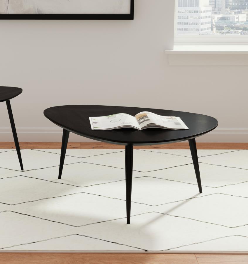 Center your living room seating around the sleek, contemporary design of this triangular coffee table. Handcrafted from solid mango wood, its black finish highlights the smooth texture of the top while enhancing its modern appeal. The triangular shape wit