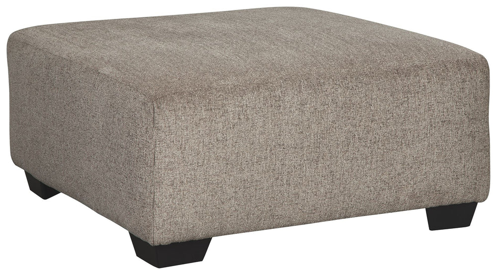 Celebrate strength and durability in design with this oversized accent ottoman. Neutral color opens doors for you to use your imagination with accessorizing the room. Softly textured chenille cushion sports stylish versatility. Throw up your feet or use i
