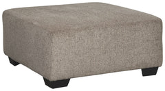 Celebrate strength and durability in design with this oversized accent ottoman. Neutral color opens doors for you to use your imagination with accessorizing the room. Softly textured chenille cushion sports stylish versatility. Throw up your feet or use i