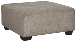 Celebrate strength and durability in design with this oversized accent ottoman. Neutral color opens doors for you to use your imagination with accessorizing the room. Softly textured chenille cushion sports stylish versatility. Throw up your feet or use i
