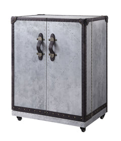 This Brancaster wine cabinet has a steamer trunk design thatâ€™s as functional as it is handsome. The aluminum exterior is punctuated with top grain leather trim, with nailhead accents at the corners and edges. Pull the soft, sturdy leather handles to rev