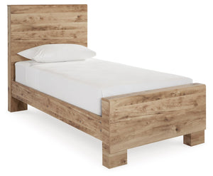 Inspired by natural beauty, refined to perfection. The Hyanna twin panel bed brings cozy outdoor vibes to your bedroom with its warm and inviting golden rustic finish. Simple and streamlined, the piece adds a subtle touch of authentic style to your space.