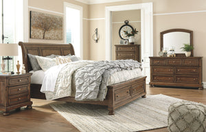 Flynnter - Medium Brown - 6 Pc. - Dresser, Mirror, Queen Sleigh Bed with 2 Storage Drawers, Nightstand