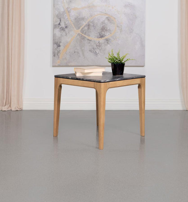  the end table offers a delightful contrast with its square high-pressure laminate top that marvelously mimics marble. A testament to mid-century modern design