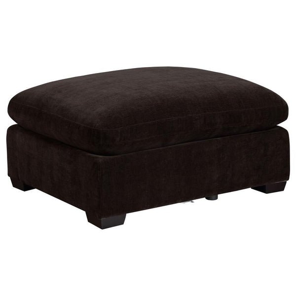 With the easy style of ultra-modern living, the ottoman delivers a streamlined motif with ultimate versatility. A classic layered design offers plush, plump aesthetics merged with a boxy, wood-constructed base. Smooth fabric upholstery covers wood framing