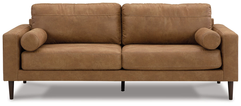 Small-scale style, tailored to perfection. This sofa echoes retro aesthetics with warm caramel faux leather, while its ultra-linear silhouette incorporates a contemporary edge. Versatile in form and function, the seat suits styles from modern boho to tran