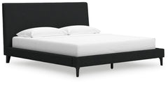 This king upholstered bed reflects your sophisticated approach to boho style. Crafted with both form and function in mind, its black boucle fabric brings trend-right beauty to bedtime. The versatile design suits all-neutral spaces or blends with your favo