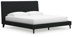 This king upholstered bed reflects your sophisticated approach to boho style. Crafted with both form and function in mind, its black boucle fabric brings trend-right beauty to bedtime. The versatile design suits all-neutral spaces or blends with your favo