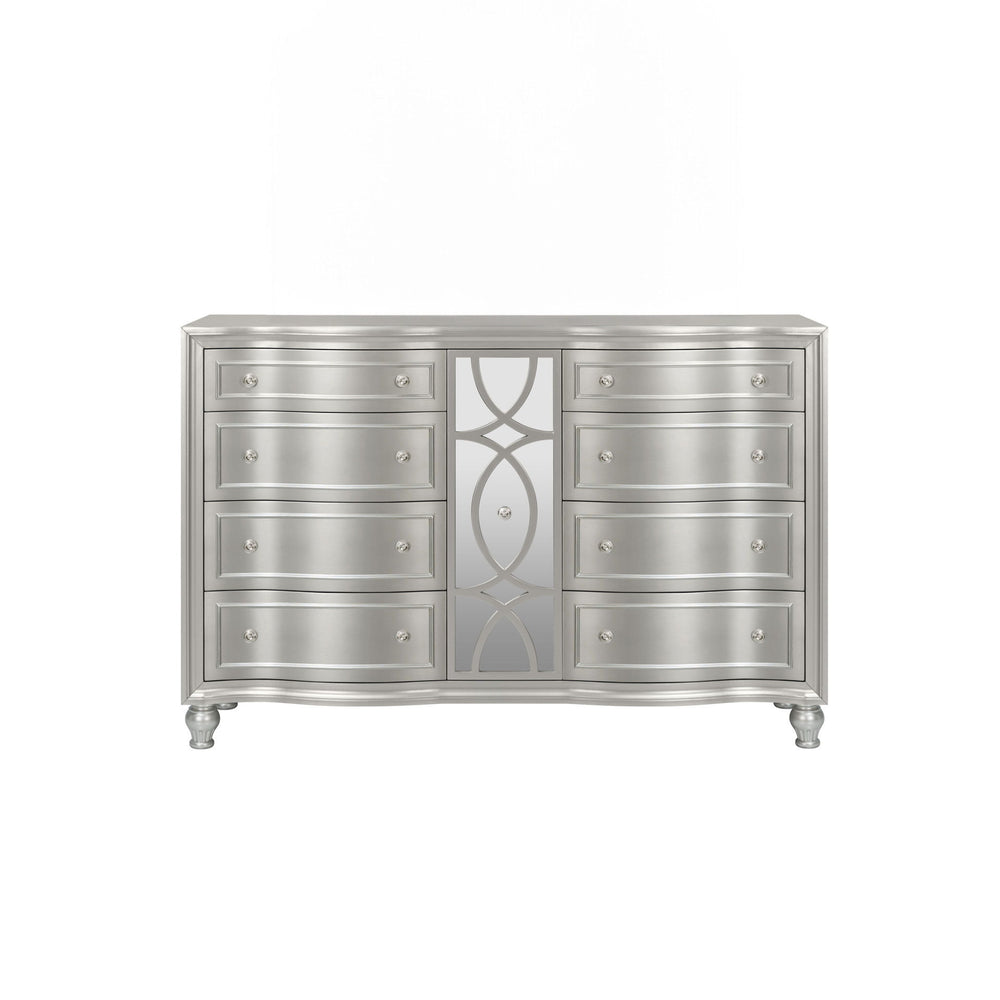 Discover the Reflection Dresser in Silver, meticulously crafted from solid Pine and high-quality manufactured wood to ensure enduring strength and durability. Its glamorous matte silver finish exudes sophistication, reflecting the mirrored panel and silve