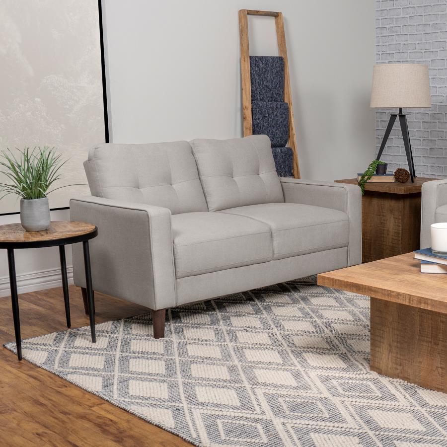 Ideal for studio apartments or small rooms, this loveseat boasts a perfect small-scale design. Its classic track arm and self-welt detailing highlight the superior tailoring. The grid-tufted boxed back cushions and pocket coil spring cushion construction 