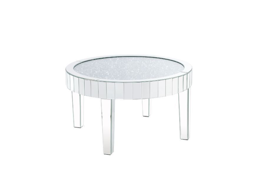 This piece strikes a sleek, clean-lined silhouette accented by faux diamonds and mirrored finish. Adding depth and dimension to your room while upping the wow factor in your home. This Ornat Coffee Table is ideal for displaying your precious family photos
