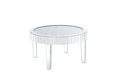 This piece strikes a sleek, clean-lined silhouette accented by faux diamonds and mirrored finish. Adding depth and dimension to your room while upping the wow factor in your home. This Ornat Coffee Table is ideal for displaying your precious family photos
