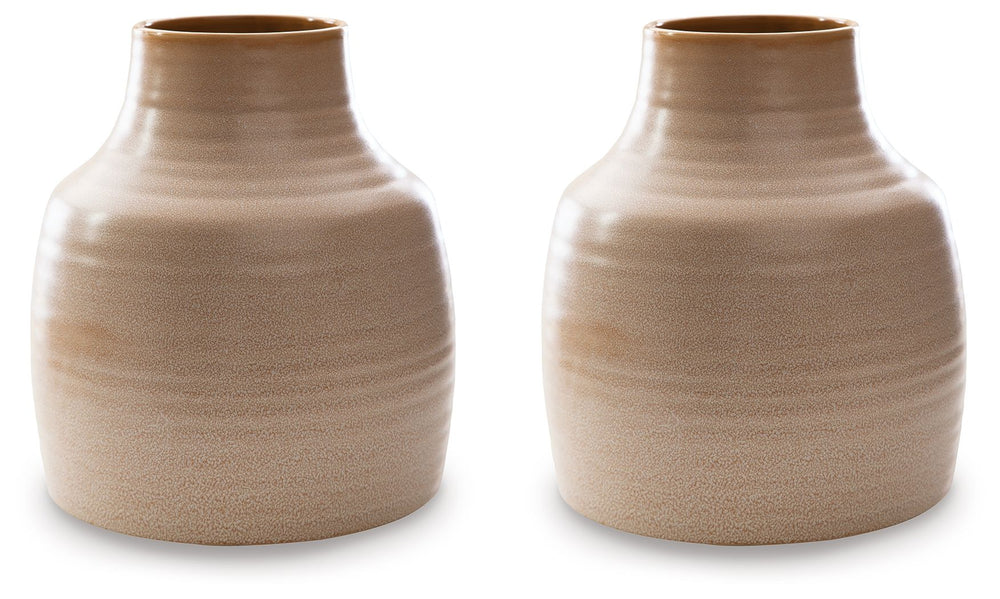 This vase looks beautiful on a shelf in the living room or as a centerpiece on your dining room table displaying your favorite blooms. The vase is finished with a reactive glazeâ€”a technique admired for its variegated coloringâ€”so each is one of a kind.