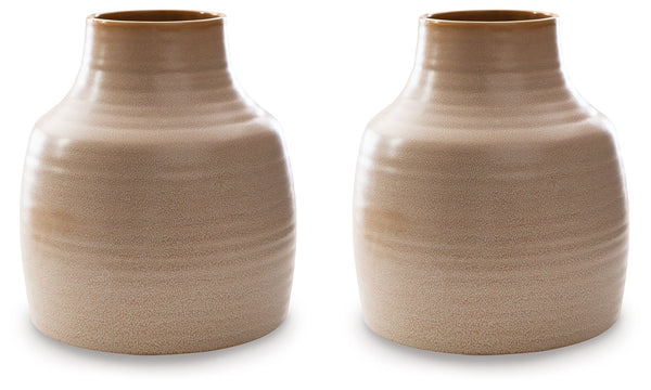 This vase looks beautiful on a shelf in the living room or as a centerpiece on your dining room table displaying your favorite blooms. The vase is finished with a reactive glazeâ€”a technique admired for its variegated coloringâ€”so each is one of a kind.