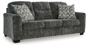  the plush upholstery and dark tri-block legs are a natural complement for so many color schemes. Two accent pillows make th