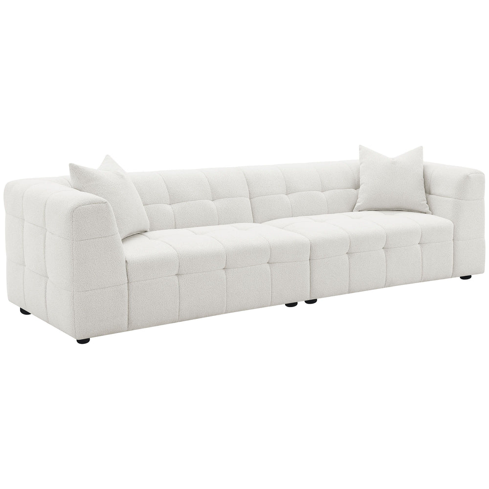 Introduce a touch of playful sophistication to your living space with this extra long 114-inch sofa. Designed for those who appreciate both style and comfort, this extra long sofa features fun geometric details, a detailed grid tufted design, and soft tex