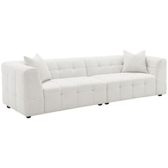 Introduce a touch of playful sophistication to your living space with this extra long 114-inch sofa. Designed for those who appreciate both style and comfort, this extra long sofa features fun geometric details, a detailed grid tufted design, and soft tex