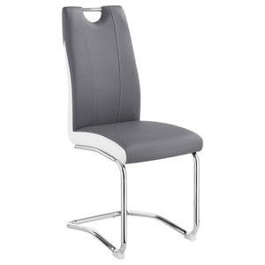  the chair showcases a sculpted silhouette highlighted by tailored welt trim. A polished chrome b