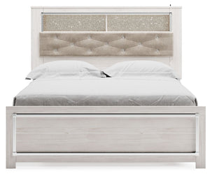  a pearlized finish and button-tufted upholstery bring a glam touch to the richly rustic appearance. Remote-co