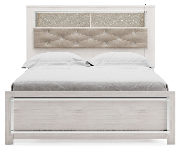  a pearlized finish and button-tufted upholstery bring a glam touch to the richly rustic appearance. Remote-co