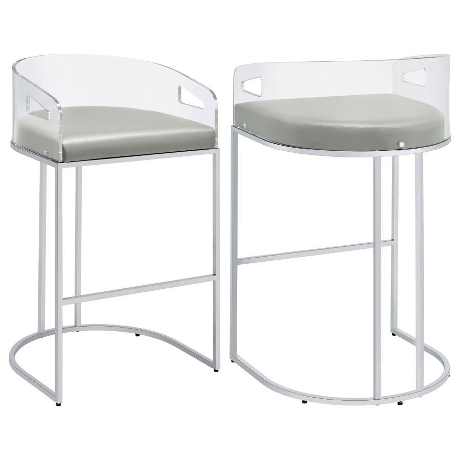 Ultra-modern with a retro-inspired vibe, this pair of stools make a striking piece to a dining room space. With a curved backrest in a clear acrylic material, each stool offers an open and airy design. Rest comfortably on a leatherette cushion as you dine