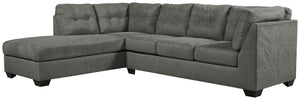  this sectional makes it easy to relax and entertain in style. Boxed seat cushions and tufted back cushions with stitched detailing define the chic