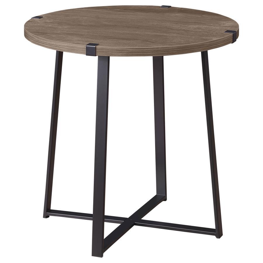 Soft brown on the tabletop creates a stylish sense of contrast for this modern round end table. Showing off a timeless silhouette, the table stands on a pair of intersecting U-shaped supports, each in a black finish over metal construction. Bracket detail