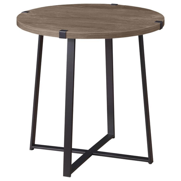 Soft brown on the tabletop creates a stylish sense of contrast for this modern round end table. Showing off a timeless silhouette, the table stands on a pair of intersecting U-shaped supports, each in a black finish over metal construction. Bracket detail