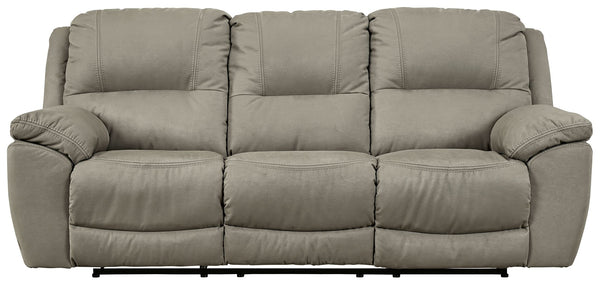 Kick back, relax, and enjoy some sports on TV with this reclining sofa. You will love its double stuffed pillow top arms and soft-as-suede faux leather upholstery. The family-friendly dark gray color and creative stitching add panache. Recline in comfort 