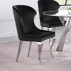  while the individually hand-driven nailhead trim adds a luxurious touch. Wrapped in soft velvet upholstery