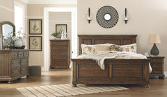 Made with Acacia veneers/engineered board and hardwood solids with a tobacco brown finish. Framed drawers feature fully finished dovetailed drawer boxes, ball bearing side glides and round metal knobs in an aged brass color finish. Dresser features a hidd