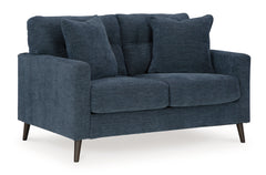 Feed your mid-century modern nostalgiaâ€”with a contemporary twist. A vibrant trend-right hue and comfy feel make this loveseat perfect for lounging solo or with friends and family. Its linear profile adds plenty of fresh style, and the tapered accent leg