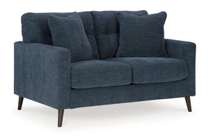 Feed your mid-century modern nostalgiaâ€”with a contemporary twist. A vibrant trend-right hue and comfy feel make this loveseat perfect for lounging solo or with friends and family. Its linear profile adds plenty of fresh style, and the tapered accent leg